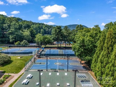 Offered turnkey and fully furnished, this energy efficient newer on Rumbling Bald Resort on Lake Lure in North Carolina - for sale on GolfHomes.com, golf home, golf lot