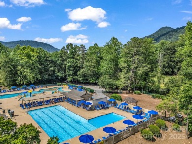 Offered turnkey and fully furnished, this energy efficient newer on Rumbling Bald Resort on Lake Lure in North Carolina - for sale on GolfHomes.com, golf home, golf lot