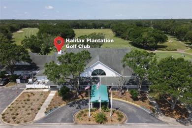 Welcome to 1442 Carlow Circle. This easy maintenance attached on Halifax Plantation Golf Club in Florida - for sale on GolfHomes.com, golf home, golf lot