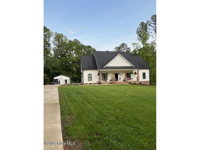 Welcome to beautiful home on large lot in gated community of on River Golf and Country Club at Lake Royale in North Carolina - for sale on GolfHomes.com, golf home, golf lot