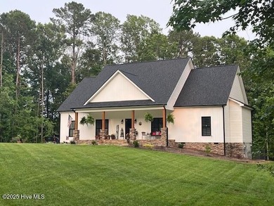 Welcome to beautiful home on large lot in gated community of on River Golf and Country Club at Lake Royale in North Carolina - for sale on GolfHomes.com, golf home, golf lot