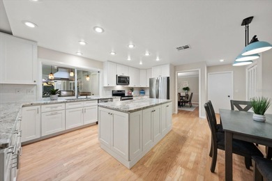 West-facing golf course views and sunset exposure define this on Countryside Country Club in Florida - for sale on GolfHomes.com, golf home, golf lot