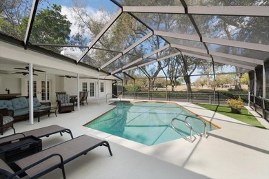 West-facing golf course views and sunset exposure define this on Countryside Country Club in Florida - for sale on GolfHomes.com, golf home, golf lot