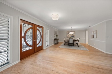 West-facing golf course views and sunset exposure define this on Countryside Country Club in Florida - for sale on GolfHomes.com, golf home, golf lot