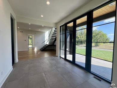 Located on a quiet, low-traffic street in the prestigious Oasis on Alvamar Country Club in Kansas - for sale on GolfHomes.com, golf home, golf lot