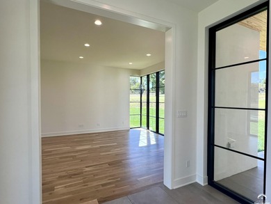 Located on a quiet, low-traffic street in the prestigious Oasis on Alvamar Country Club in Kansas - for sale on GolfHomes.com, golf home, golf lot