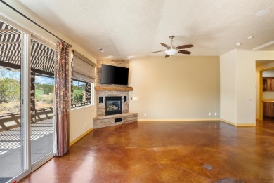 Well-kept home right on the golf course with red mountain views! on Green Spring Country Club in Utah - for sale on GolfHomes.com, golf home, golf lot