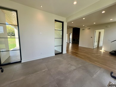 Located on a quiet, low-traffic street in the prestigious Oasis on Alvamar Country Club in Kansas - for sale on GolfHomes.com, golf home, golf lot