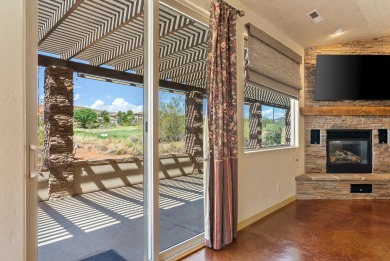 Well-kept home right on the golf course with red mountain views! on Green Spring Country Club in Utah - for sale on GolfHomes.com, golf home, golf lot