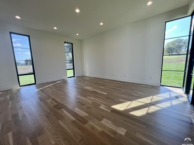 Located on a quiet, low-traffic street in the prestigious Oasis on Alvamar Country Club in Kansas - for sale on GolfHomes.com, golf home, golf lot