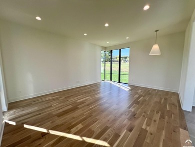 Located on a quiet, low-traffic street in the prestigious Oasis on Alvamar Country Club in Kansas - for sale on GolfHomes.com, golf home, golf lot