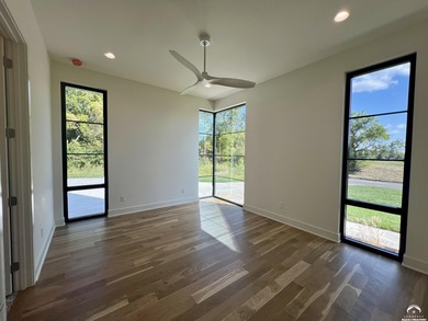 Located on a quiet, low-traffic street in the prestigious Oasis on Alvamar Country Club in Kansas - for sale on GolfHomes.com, golf home, golf lot