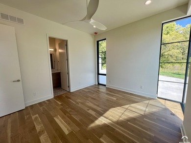 Located on a quiet, low-traffic street in the prestigious Oasis on Alvamar Country Club in Kansas - for sale on GolfHomes.com, golf home, golf lot