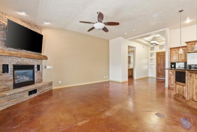 Well-kept home right on the golf course with red mountain views! on Green Spring Country Club in Utah - for sale on GolfHomes.com, golf home, golf lot