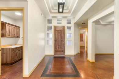 Well-kept home right on the golf course with red mountain views! on Green Spring Country Club in Utah - for sale on GolfHomes.com, golf home, golf lot