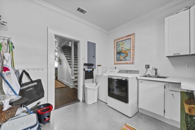 Salt air, sun-soaked days, and laid-back luxury -- that's the on Pass Christian Isles Golf Club in Mississippi - for sale on GolfHomes.com, golf home, golf lot