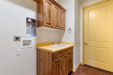 Well-kept home right on the golf course with red mountain views! on Green Spring Country Club in Utah - for sale on GolfHomes.com, golf home, golf lot