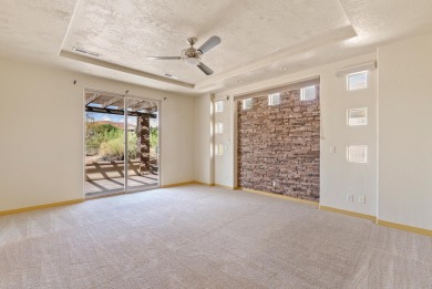 Well-kept home right on the golf course with red mountain views! on Green Spring Country Club in Utah - for sale on GolfHomes.com, golf home, golf lot