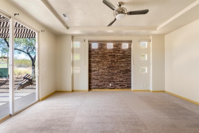 Well-kept home right on the golf course with red mountain views! on Green Spring Country Club in Utah - for sale on GolfHomes.com, golf home, golf lot