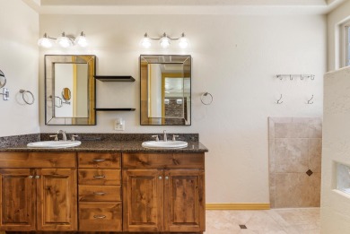 Well-kept home right on the golf course with red mountain views! on Green Spring Country Club in Utah - for sale on GolfHomes.com, golf home, golf lot