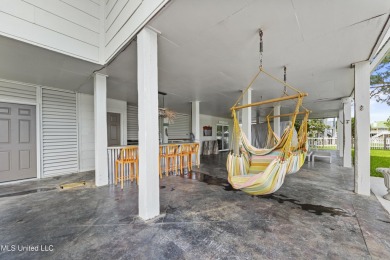 Salt air, sun-soaked days, and laid-back luxury -- that's the on Pass Christian Isles Golf Club in Mississippi - for sale on GolfHomes.com, golf home, golf lot