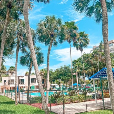 Resort style with lots of amenities located in the heart of on Pembroke Lakes Golf Club in Florida - for sale on GolfHomes.com, golf home, golf lot