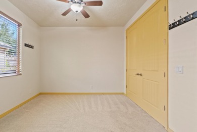 Well-kept home right on the golf course with red mountain views! on Green Spring Country Club in Utah - for sale on GolfHomes.com, golf home, golf lot