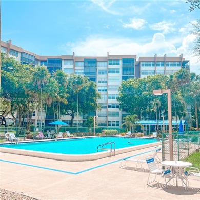 Resort style with lots of amenities located in the heart of on Pembroke Lakes Golf Club in Florida - for sale on GolfHomes.com, golf home, golf lot