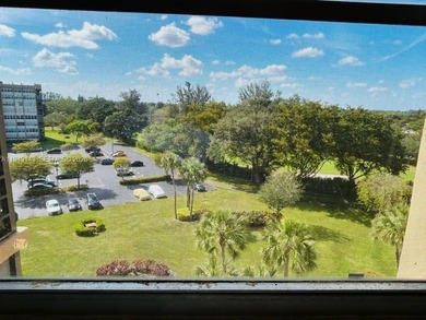 Resort style with lots of amenities located in the heart of on Pembroke Lakes Golf Club in Florida - for sale on GolfHomes.com, golf home, golf lot