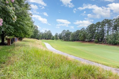 Welcome to this beautifully positioned home on an elevated lot on Brier Creek Country Club in North Carolina - for sale on GolfHomes.com, golf home, golf lot