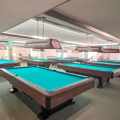 Resort style with lots of amenities located in the heart of on Pembroke Lakes Golf Club in Florida - for sale on GolfHomes.com, golf home, golf lot