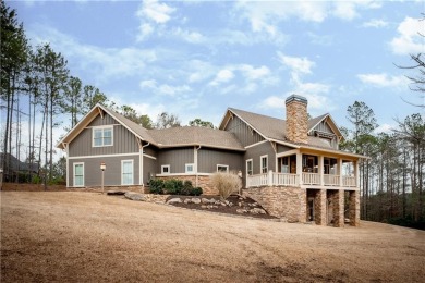 Welcome HOME to this elevated 6 bedroom, 4.5 bathroom piece of on Coweta Club in Georgia - for sale on GolfHomes.com, golf home, golf lot