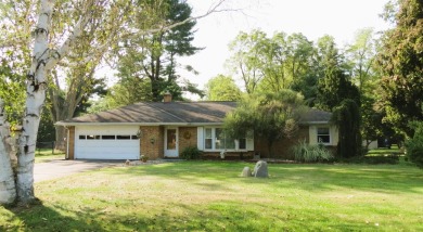 Terrific brick ranch in fantastic location! Private back yard; on Cascades Golf Course in Michigan - for sale on GolfHomes.com, golf home, golf lot