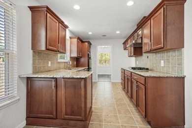This home will check all your boxes! Affordably priced, well on Page Belcher Golf Course in Oklahoma - for sale on GolfHomes.com, golf home, golf lot