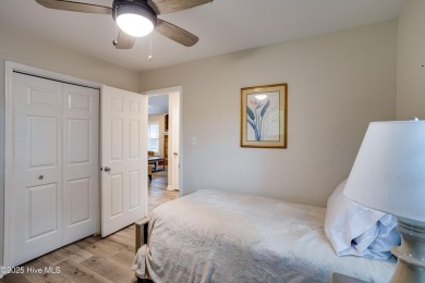 Welcome to 1513 Caracara Drive - Comfort, Style & Security in on Harbour Point Golf Club in North Carolina - for sale on GolfHomes.com, golf home, golf lot
