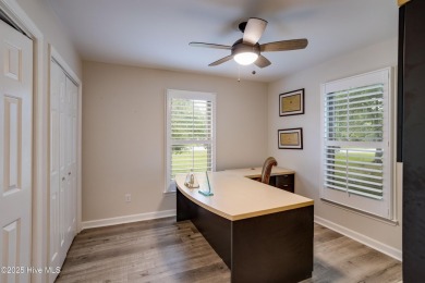Welcome to 1513 Caracara Drive - Comfort, Style & Security in on Harbour Point Golf Club in North Carolina - for sale on GolfHomes.com, golf home, golf lot