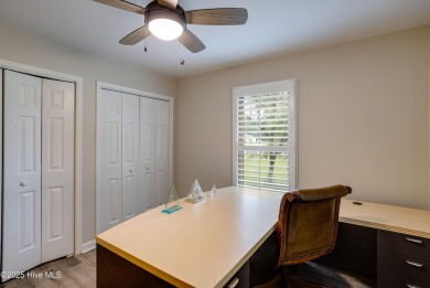 Welcome to 1513 Caracara Drive - Comfort, Style & Security in on Harbour Point Golf Club in North Carolina - for sale on GolfHomes.com, golf home, golf lot