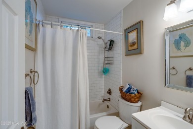 Welcome to 1513 Caracara Drive - Comfort, Style & Security in on Harbour Point Golf Club in North Carolina - for sale on GolfHomes.com, golf home, golf lot