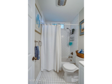Welcome to 1513 Caracara Drive - Comfort, Style & Security in on Harbour Point Golf Club in North Carolina - for sale on GolfHomes.com, golf home, golf lot