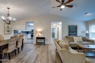 Welcome to 1513 Caracara Drive - Comfort, Style & Security in on Harbour Point Golf Club in North Carolina - for sale on GolfHomes.com, golf home, golf lot