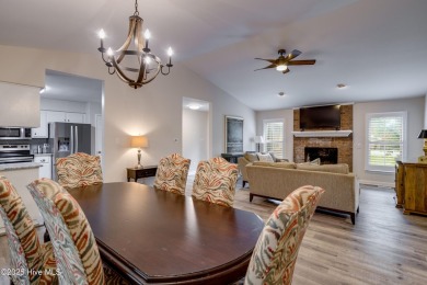 Welcome to 1513 Caracara Drive - Comfort, Style & Security in on Harbour Point Golf Club in North Carolina - for sale on GolfHomes.com, golf home, golf lot