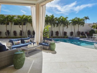 This exquisite villa, masterfully renovated in 2023 by The on Club at Pelican Bay Golf Course in Florida - for sale on GolfHomes.com, golf home, golf lot