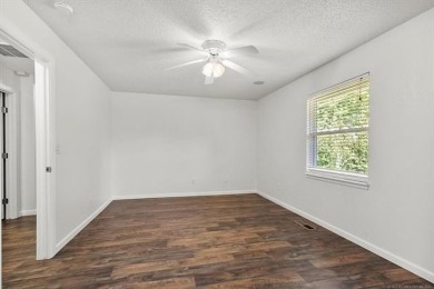 This home will check all your boxes! Affordably priced, well on Page Belcher Golf Course in Oklahoma - for sale on GolfHomes.com, golf home, golf lot