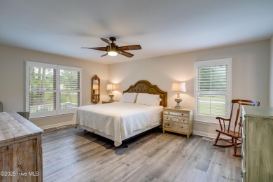 Welcome to 1513 Caracara Drive - Comfort, Style & Security in on Harbour Point Golf Club in North Carolina - for sale on GolfHomes.com, golf home, golf lot