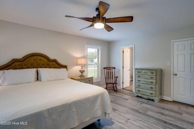 Welcome to 1513 Caracara Drive - Comfort, Style & Security in on Harbour Point Golf Club in North Carolina - for sale on GolfHomes.com, golf home, golf lot