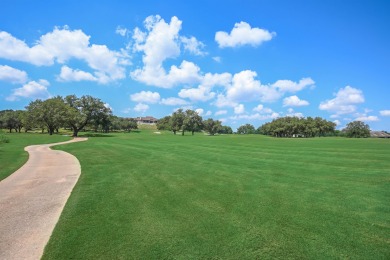 Nestled on a beautifully landscaped lot overlooking the Palmer on Palmer Lakeside At Barton Creek in Texas - for sale on GolfHomes.com, golf home, golf lot