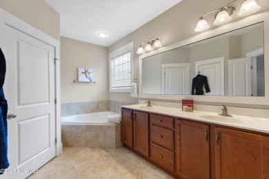 This home was featured in the 2014 Parade of Homes. Situated on on Members Club At St. James Plantation in North Carolina - for sale on GolfHomes.com, golf home, golf lot
