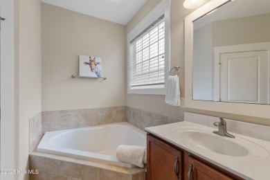 This home was featured in the 2014 Parade of Homes. Situated on on Members Club At St. James Plantation in North Carolina - for sale on GolfHomes.com, golf home, golf lot