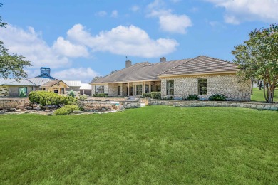 Nestled on a beautifully landscaped lot overlooking the Palmer on Palmer Lakeside At Barton Creek in Texas - for sale on GolfHomes.com, golf home, golf lot