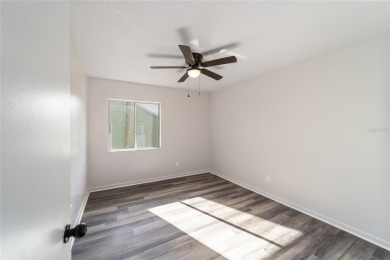 Move right in to this spacious unit with new plank flooring on Country Club At Silver Springs Shores in Florida - for sale on GolfHomes.com, golf home, golf lot